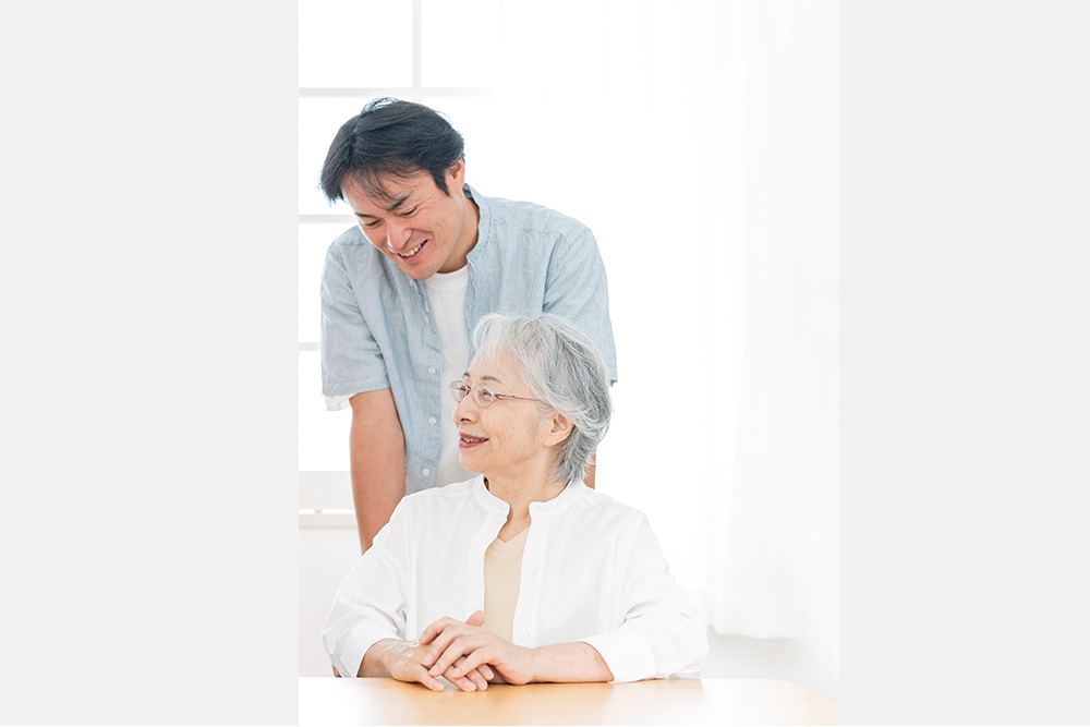 Tucking chair in gently behind the person with&nbsp;PCA